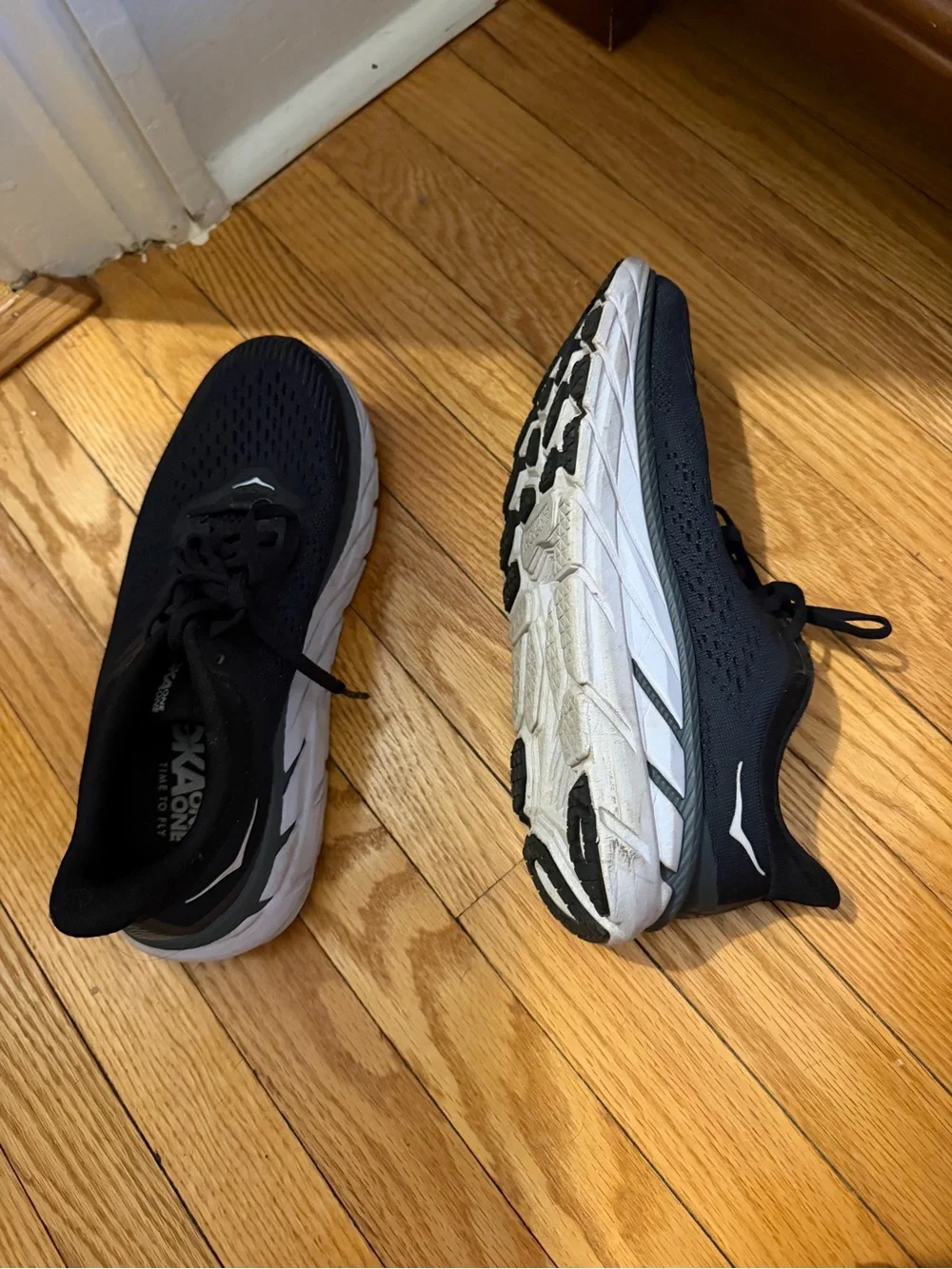Hoka Black and White Cushioning Running Sneakers